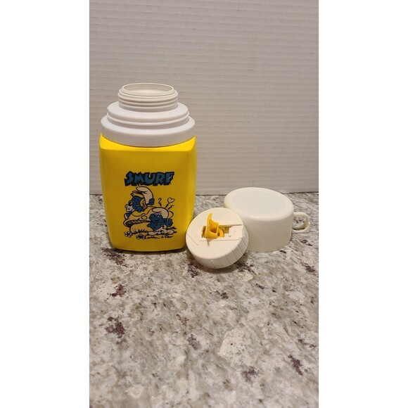 Vintage Smurf Thermos Complete w/Cup & Lid Smurfette Yellow - Picture 1 of 6